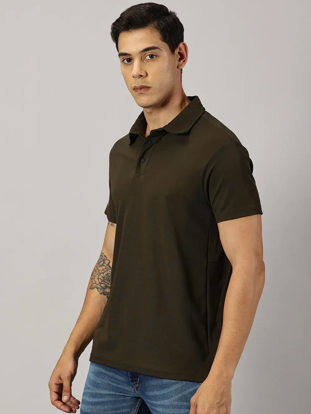 A model wearing Blue Tyga olive odor-free polo t-shirt