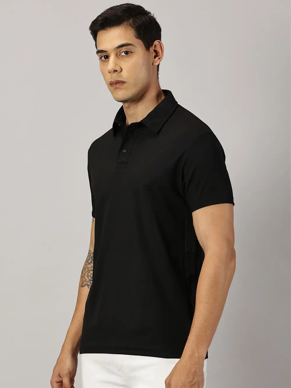 A model wearing Blue Tyga black odor-free polo t-shirt