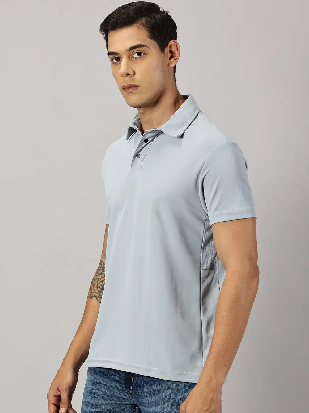 A model wearing Blue Tyga columbia blue odor-free polo t-shirt