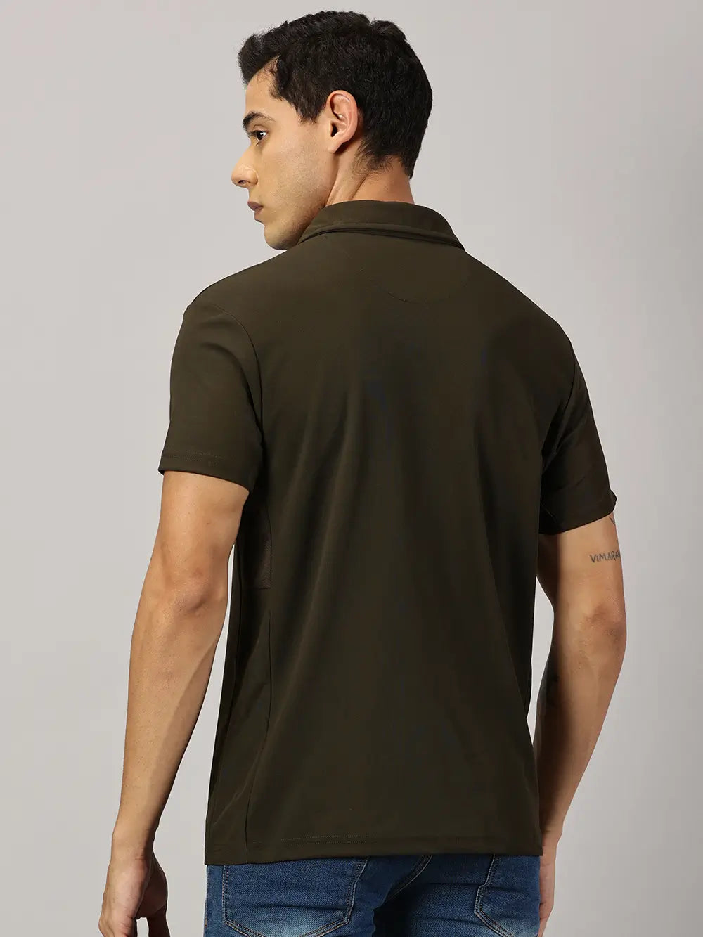 A model wearing Blue Tyga olive odor-free polo t-shirt