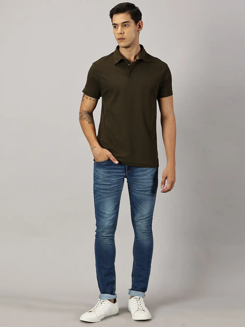 A model wearing Blue Tyga olive odor-free polo t-shirt