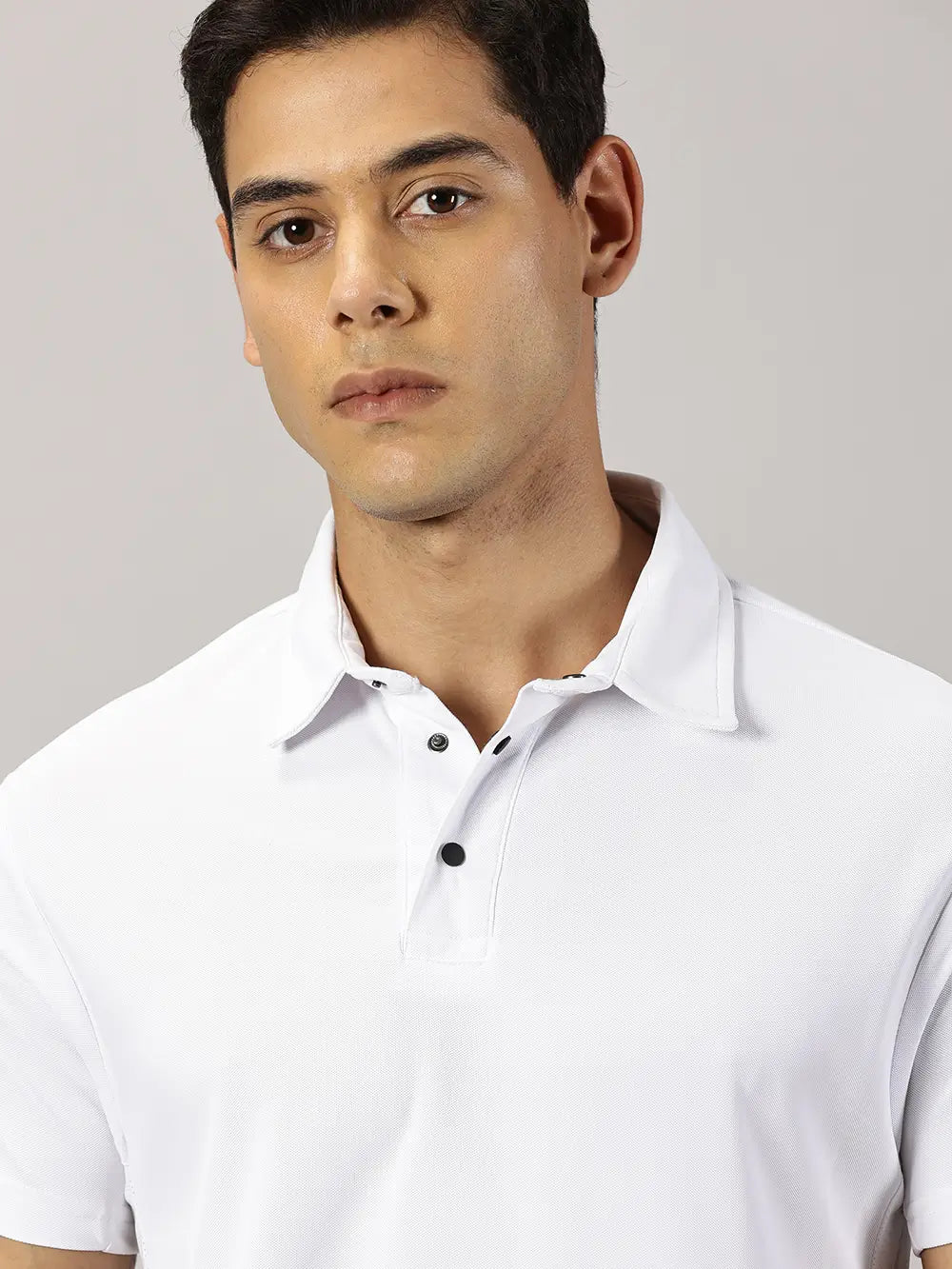 A model wearing Blue Tyga odor-free white polo t-shirt