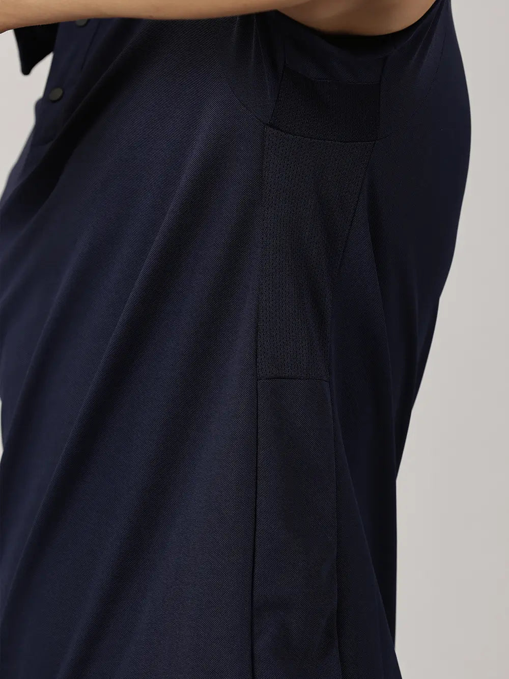 A model wearing Blue Tyga navy blue odor-free polo t-shirt