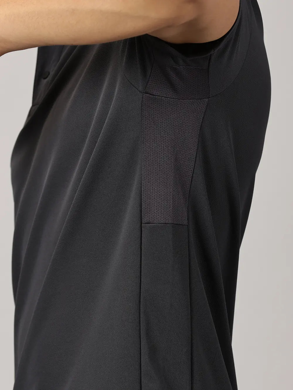 A model wearing Blue Tyga dark grey odor-free polo t-shirt