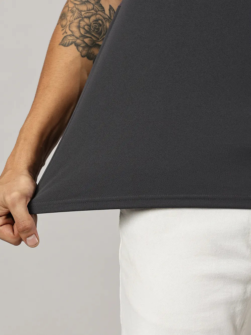 A model wearing Blue Tyga dark grey odor-free polo t-shirt
