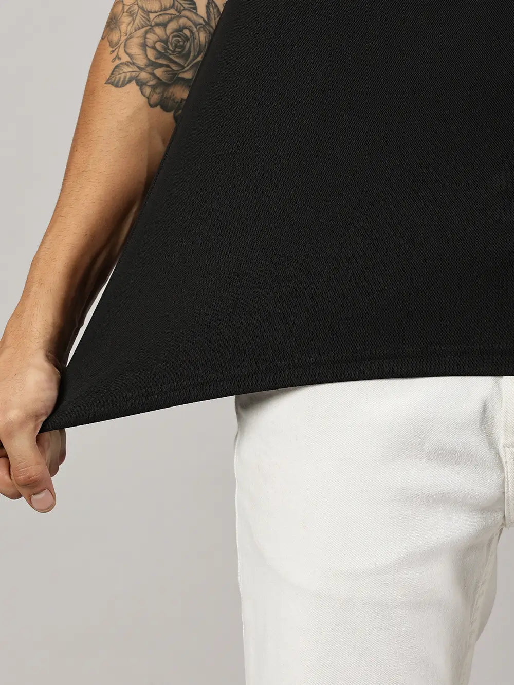 A model wearing Blue Tyga black odor-free polo t-shirt