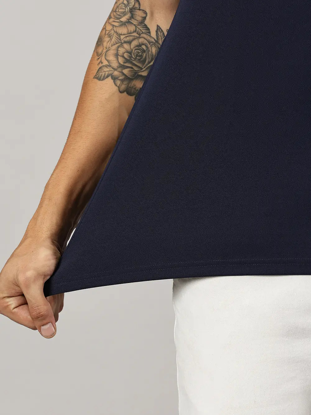 A model wearing Blue Tyga navy blue odor-free polo t-shirt
