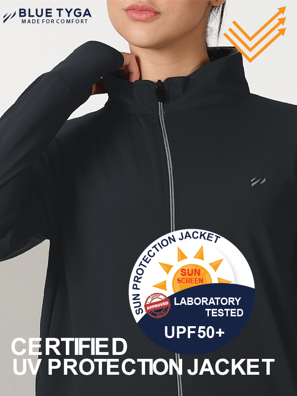 Woman wearing a high-collar Blue Tyga sun protection jacket in black, certified with UPF50+ rating, laboratory tested for effective UV screening, indicated by sunscreen approval badge